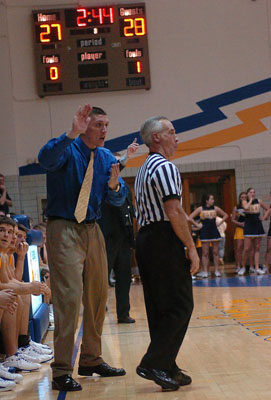 St. Marys boys basketball coach Josh Leslie, left, did a great job of maneuvering his team through an injury-riddled season in which the Roughriders still posted a 14-7 record, their first wining mark since the 1993-94 season when they went 16-7.<br>dailystandard.com