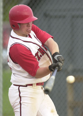 St. Henry's Andy Puthoff takes a cut at the ball during Thursday's game at New Knoxville. Puthoff went 1-for-2 with two runs scored as the Redskins posted a 12-0 win in five innings.<br>dailystandard.com