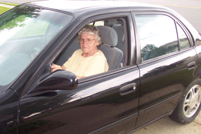Pauline Ruschau of St. Marys looks right at home behind the steering wheel of her GEO Prizm. She received her driver's license at the age of 75 after enrolling in classes offered by Capabilities in St. Marys.<br>dailystandard.com
