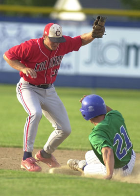 Grand Lake's Scott Billak, 21, slides into second as Columbus shortstop Matt Repec tries to bring down the tag.<br>dailystandard.com