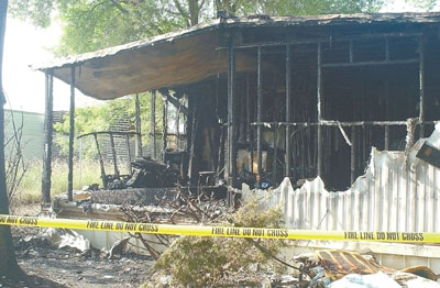 St. Marys township and city fire departments responded to a fire at this trailer in Columbia Square Trailer Park in St. Marys shortly after 8 a.m. Wednesday. Rose Parkison, 47, lost her life in the blaze. Her husband and five children emerged safely from the fire.<br>dailystandard.com