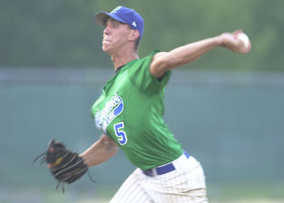 Grand Lake pitcher Andy Delagarza fires the ball to home plate during Wednesday's game against Indianapolis at Jim Hoess Field. Delagarza got a no-decision despite pitching seven strong innings, but the Mariners won 3-2 to improve to 20-12 on the summer.<br>dailystandard.com