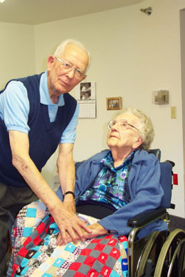 The Rev. Arnold Meckstroth tucks a lap blanket around his wife Martha at Otterbein St. Marys Retirement Community. The couple are marking their 74th wedding anniversary several months earlier with a dinner party planned later today.<br>dailystandard.com