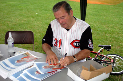 Former Cincinnati Red Jim O'Toole signs autographs during Friday's game between Grand Lake and Lima.<br>dailystandard.com