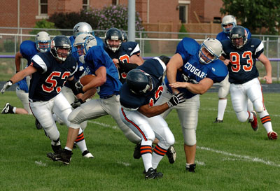 Chad Timmerman, with ball, rushed for 144 yards and four touchdowns as Mercer County picked up its third win with a convincing 53-8 victory over the South Central Broncos.<br>dailystandard.com