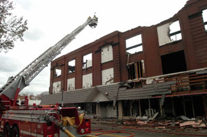 Fire began late Sunday night in the Donnerberg building on Spring Street, St. Marys. Seven fire departments were called in to help contain the blaze. Firefighters expect to remain on the scene most of today attending to possible hot spots.<br>dailystandard.com