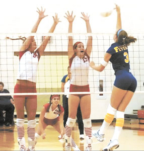 St. Henry players Lindsay Puthoff, 34, Lindsey Thobe, 21, and Kayla Lefeld, 15, will look to put the Redskins into the state final four. The Redskins play Jackson Center on Wednesday in the regional semifinals.<br>dailystandard.com