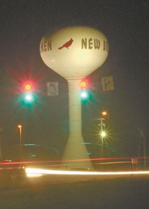 Cars pass through the new stop light on state Route 66 and Amsterdam Road between Minster and New Bremen. Village officials are working on a corridor plan to control traffic flow, speed, landscaping and development along state Route 66 connecting the two villages.<br>dailystandard.com