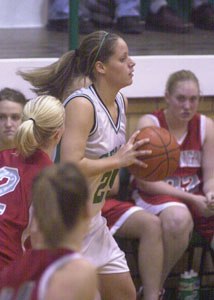 Celina's Kinsey Schumann fires a pass to a teammate during Thursday's Western Buckeye League clash at the Fieldhouse. Celina committed 23 turnovers and Van Wert escaped with a 37-34 win.<br>dailystandard.com