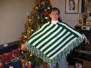 Judy Needham of Mendon works at her knitting machine making ponchos at her rural home. The poncho business started about six months ago simply by word of mouth after she made one for her 7-year-old granddaughter. Now she says she can harly keep up with orders. <br>dailystandard.com