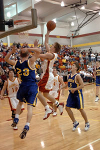 New Bremen's Troy Lammers goes up high for a shot against Russia. Lammers had 15 points as the Cardinals improve to 6-0.<br>dailystandard.com