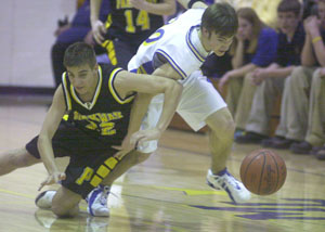 Marion Local's Curtis Moeller, right, steals the ball away from Parkway's Jordan Heckler, left, during their game on Friday night. Marion Local defeated Parkway, 60-42.<br>dailystandard.com