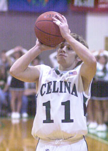 Celina's Seth Staugler fires a three-pointer during Monday's game against Kenton at the Fieldhouse. Staugler hit for a career-high 19 points in the 61-53 Bulldogs win.<br>dailystandard.com