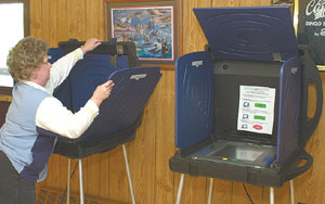 The touch screen voting machines, shown above, that were set up in Auglaize County for the May primary in 2003 will no longer be used. Elections boards throughout the state must go to an optical scan voting system before the March primary, due to orders by Secretary of State Kenneth Blackwell.<br>dailystandard.com