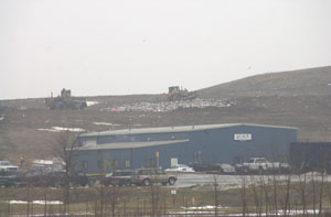 Heavy equipment is at work on this hazy morning outside the Celina Sanitary Landfill, off Depweg Road south of Celina. Landfill management is seeking approval to expand the landfill 20 feet higher than originally approved. If the expansion is approved, Franklin Township stands to benefit monetarily.<br>dailystandard.com