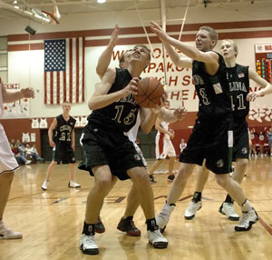 Celina's Scott Luthman, 15, gets ready to go up strong to the basket. Luthman scored 19 points and pulled down nine rebounds to help Celina stay on top of the WBL.<br>dailystandard.com