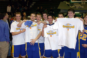 St. Marys players show their Western Buckeye League championship t-shirts after winning the league title outright on Friday night at the Celina Fieldhouse. St. Marys defeated Celina, 41-36 to win the title. <br>dailystandard.com