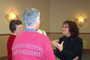 Dr. Pamela Gardner, right, speaks with women about the importance of heart health following a Ladies' Day Out program at the Galleria. Joint Township District Memorial Hospital in St. Marys hosted the Saturday morning program which drew 150 area women.<br>dailystandard.com