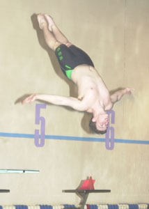 Celina's Eddie Craft executes a dive during practice this week leading up to yesterday's start of the state swimming and diving championships. Craft finished 16th to earn All-Ohio honors at the state meet.<br>dailystandard.com