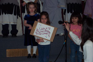 Youngsters ages 3-12 presented a youth service Sunday morning at The Lord's Church in Celina. Cyrah Tajalle, Monique Thomas and Isabelle Kremer, join in singing songs and sharing scripture. <br>dailystandard.com