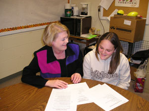 Gateway's Paulette Strine and Celina middle school student Katrina Fuson compare notes on Celina's Tobacco Education Group, which Katrina recently attended.<br>dailystandard.com