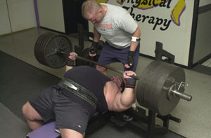 Mike Wolfe, 30, of Celina, lifts weights in preparation for his first professional weightlifting event, the American Powerlifting Federation Cash or Crush Championships in Middletown on April 30.<br>dailystandard.com