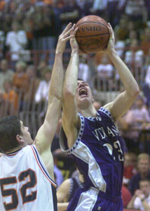Fort Recovery's Sean Kahlig, 23, goes up strong to the hoop. Kahlig scored 14 points and pulled down seven rebounds.<br>dailystandard.com