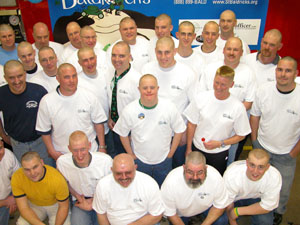 This group of 27 men, consisting mostly of firemen, and one woman had their heads shaved at the Chickasaw Firehouse Wednesday at the St. Baldrick's Day fund-raiser. Approximately $5,000 was raised for research to fight childhood cancer.<br>dailystandard.com