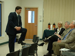 Ohio Lieutenant Governor Bruce Johnson discusses development issues with Judy Cowan, left, from Gov. Bob Taft's regional economic development office, Mercer County development director Larry Stelzer and Mercer County Commissioner Bob Nuding, during a visit at Celina Aluminum Precision Technology (CAPT) last week. CAPT recently announced an expansion project that could add up to 54 jobs. <br>dailystandard.com