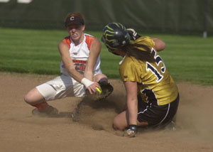 Parkway's Erica Yoder, 15, slides safely into second base as Coldwater's Renee Hemmelgarn, left, catches the ball during Division III district semifinals action at Elida on Tuesday. Parkway defeated Coldwater, 7-3.<br>dailystandard.com