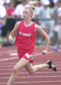 St. Henry's Catie Evers cruises around the track during the 400-meter run on Saturday at the state track meet in Columbus. Evers finished in third place with her best time of the season, a 57.95.<br>dailystandard.com