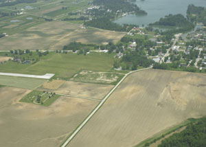 Cassella-Montezuma Road, to the right of the runway, will no longer be a through road when the extension of the Lakefield Airport runway is completed. Preliminary work on the road and improvements on Guadalupe and Burge roads will begin later this year and construction is slated for next spring and summer.<br>dailystandard.com