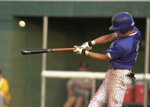 Grand Lake second baseman Ryan Keena lines a single during the first inning of action against the Portland Rockets in a nonleague game at Jim Hoess Field on Thursday night for the Mariners. Keena is off to a great start this summer after recording three stolen bases in each of the first two Mariners contests. The Mariners defeated Portland, 5-2.<br>dailystandard.com