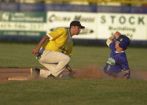 Grand Lake's Ryan Keena, right, is caught stealing at second base as Portland's Kyle Dygert, left, places the tag on the Mariners speedster. Keena had a big day for the Mariners going 3-for-4 with five RBI to help Grand Lake win, 10-0.<br>dailystandard.com