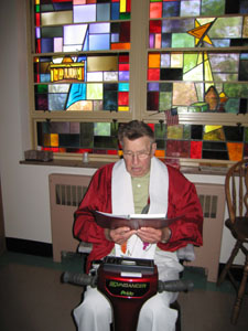 The Rev. Arnold Meiring, who is marking his 65th year in the priesthood, sits in the infirmary chapel at St. Charles Center in Carthagena preparing for  Mass. An observance honoring Meiring and other religious with milestone anniversaries takes place July 1.<br>dailystandard.com