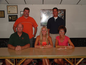 St. Henry volleyball star Lindsay Puthoff, seated center, will attend the University of New Orleans this fall and play for the Privateer volleyball team. Seated with Lindsay are parents Frank and Pat Puthoff. Club team coaches Lonnie Cain, left, and Greg Snipes are in the back.<br>dailystandard.com