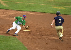 Grand Lake's Bryant Witt, left, tries to get over and tag out Lake Erie's Noah Lankford, 3, during Friday's GLSCL tournament game at Bill Davis Stadium in Columbus.<br>dailystandard.com