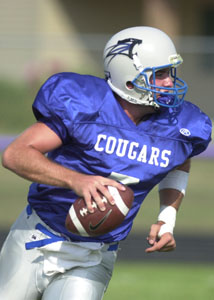 Mercer County quarterback Adam Wenning struggled with his passing, but his 24-yard field goal as time expired helped the Cougars win, 17-14, to be the lone unbeaten in the IFL. <br>dailystandard.com