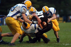 A group of Marion Local defenders bring down Parkway's Andy Long during their game on Friday night in Rockford. Marion Local is now 3-1 on the season following a 38-0 win over the Panthers in Midwest Athletic Conference action.<br>dailystandard.com