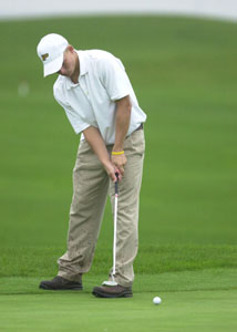 Parkway's Trevor Krogman putts on a green during the Midwest Athletic Conference championship held at the Fox's Den. Krogman tied for ninth on Saturday, but was the MAC Player of the Year.<br></br>dailystandard.com