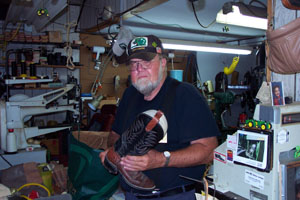 Pete Schaefer, owner of Pete's Shoe Repair between Coldwater and St. Henry, continues working on shoes and boots after 30 years in the business. <br></br>dailystandard.com