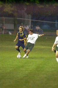 Celina's David Skoczyn, 19, battles with Ottawa-Glandorf's Dane Mansfield, 12, for the ball.<br></br>dailystandard.com