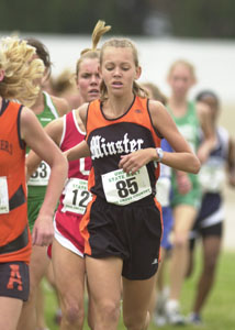 Minster's Lei Bornhorst runs along with the pack at the Division III girls cross country meet held on Saturday in Columbus. Bornhorst finished 25th to help Minster win its sixth state cross country state championship and the 21st state title in school history. More from the state cross country meet can be found on page 1B. <br></br>dailystandard.com