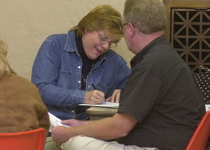 Mercer County Mental Retardation and Developmental Disabilities Superintendent Mike Overman and Cindy Shaffer, the program's community employment coordinator, tabulate early elections returns at the Mercer County Courthouse on Tuesday evening.<br></br>dailystandard.com