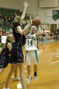 Celina's Amy Harner goes up for a jump shot. Harner hit four big free throws late in the game to keep Celina in the lead.<br></br>dailystandard.com