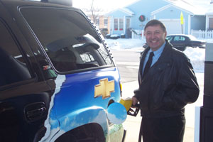 Greg Freewalt, St. Marys mayor, pumps the new E85 fuel at the St. Marys Marathon station.<br></br>dailystandard.com