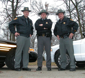 Mercer County Sheriff Jeff Grey, Lt. Dan Lay of the Wapakoneta post of the Ohio State Highway Patrol and Auglaize County Sheriff Al Solomon are teamed up to help keep area roadways accident-free. The local law enforcement leaders are jointly involved in several traffic-related programs they hope will keep Grand Lake residents safe in 2006.<br></br>dailystandard.com