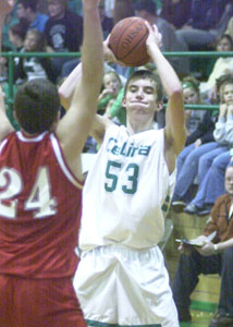 Celina's Andy Muhlenkamp, 53, looks for an open teammate in the post as Van Wert's Jordan Kline, 24, defends on the play. Van Wert defeated Celina, 38-35.<br></br>dailystandard.com