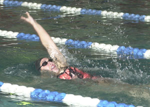 Coldwater's Brittany Klenke shows perfect form during the backstroke portion of the girls 200 individual medley at the MAC Invitational held Saturday at the Celina YMCA. Klenke won two races.<br></br>dailystandard.com