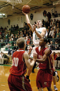 Celina's Scott Luthman goes up over the Toledo Central Catholic defense. Luthman had 16 points in the Bulldogs win over the Irish.<br></br>dailystandard.com